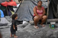 美國得州與聯(lián)邦“斗法”　移民問題撕出“國家離婚”